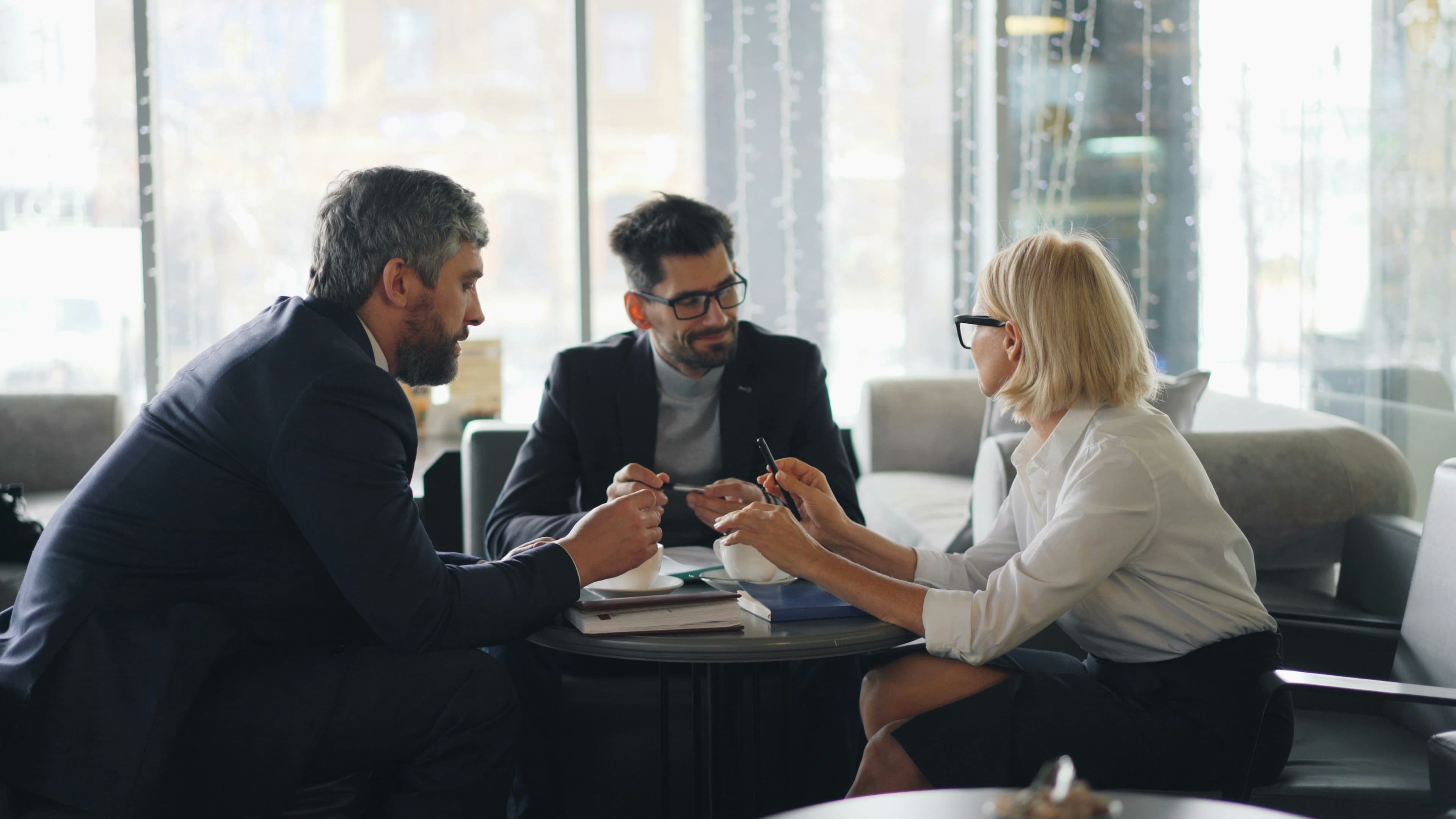 Business professionals discussing a personalized financial solution